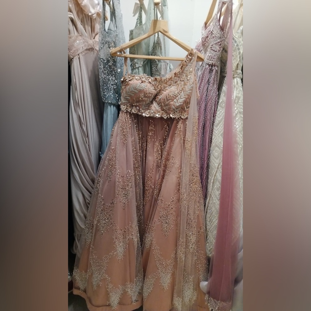 One shoulder peach/pink lehnga w/ 2 dupattas - 1 attached(removable), 1 regular